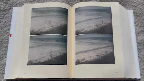 Illustrations from the novel theMystery.doc by Matthew McIntosh. Four frames from a film showing a man -- wearing a dress shirt, pants, and a tie -- walking out of the sea.